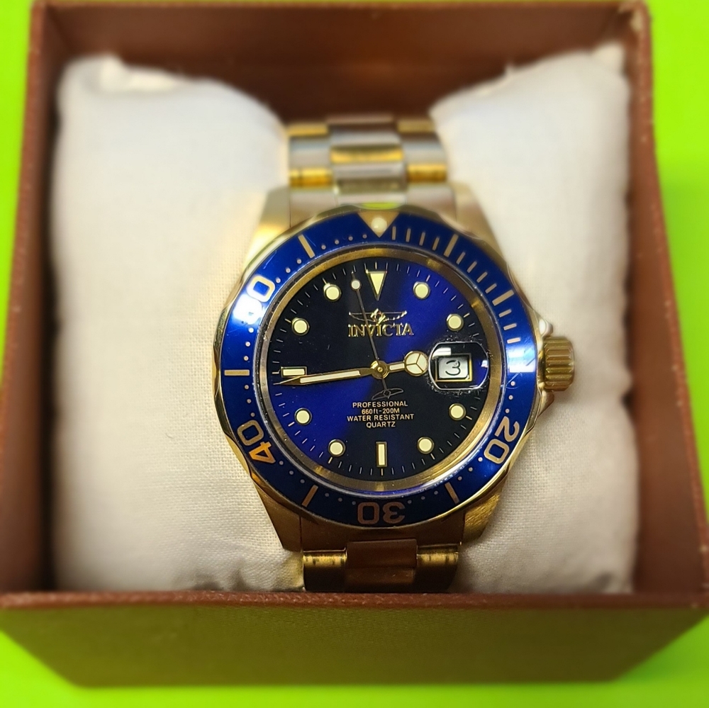 Invicta professional two tone gold watch model 28949